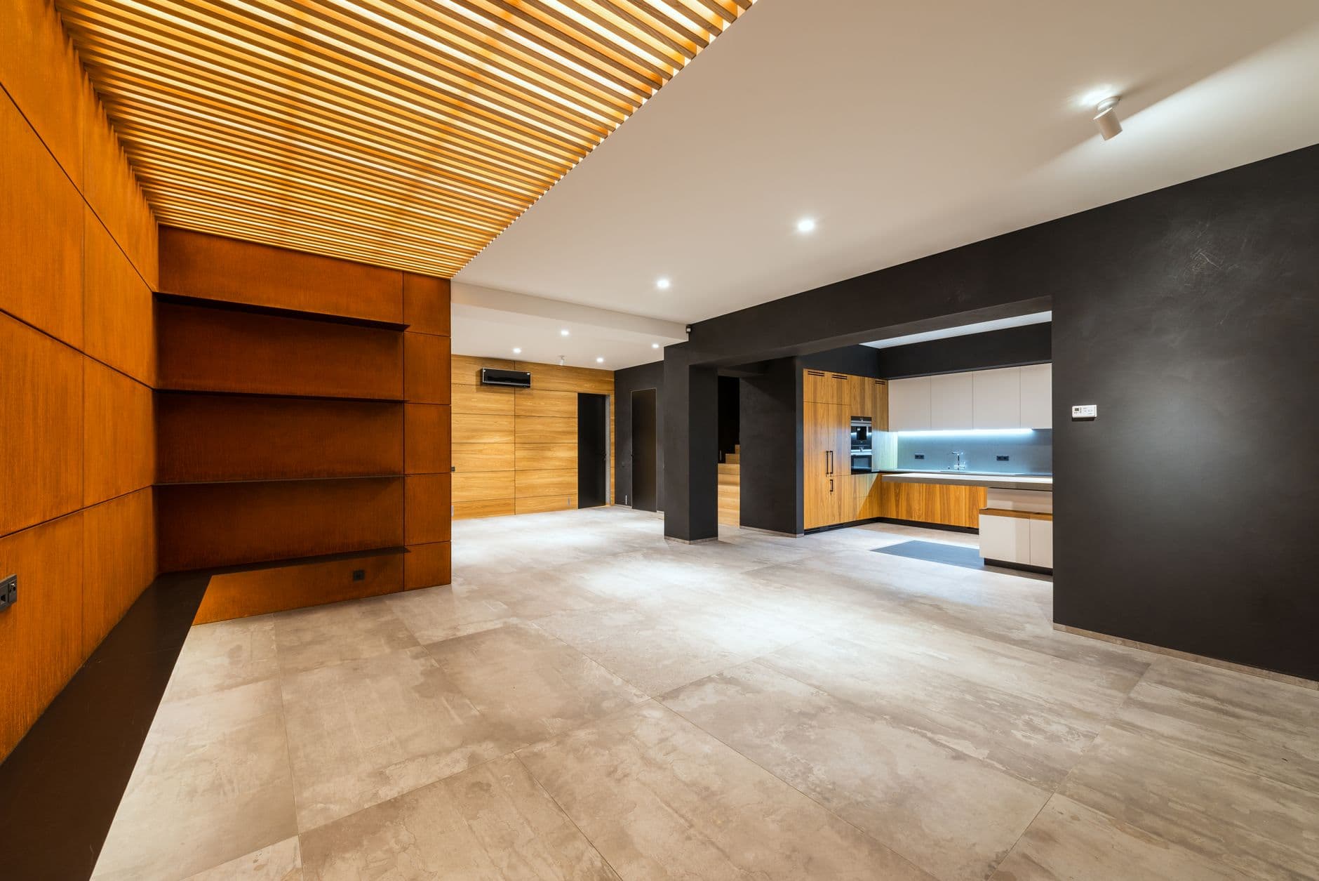 Bright renovated interior with clean lines and warm wood accents.