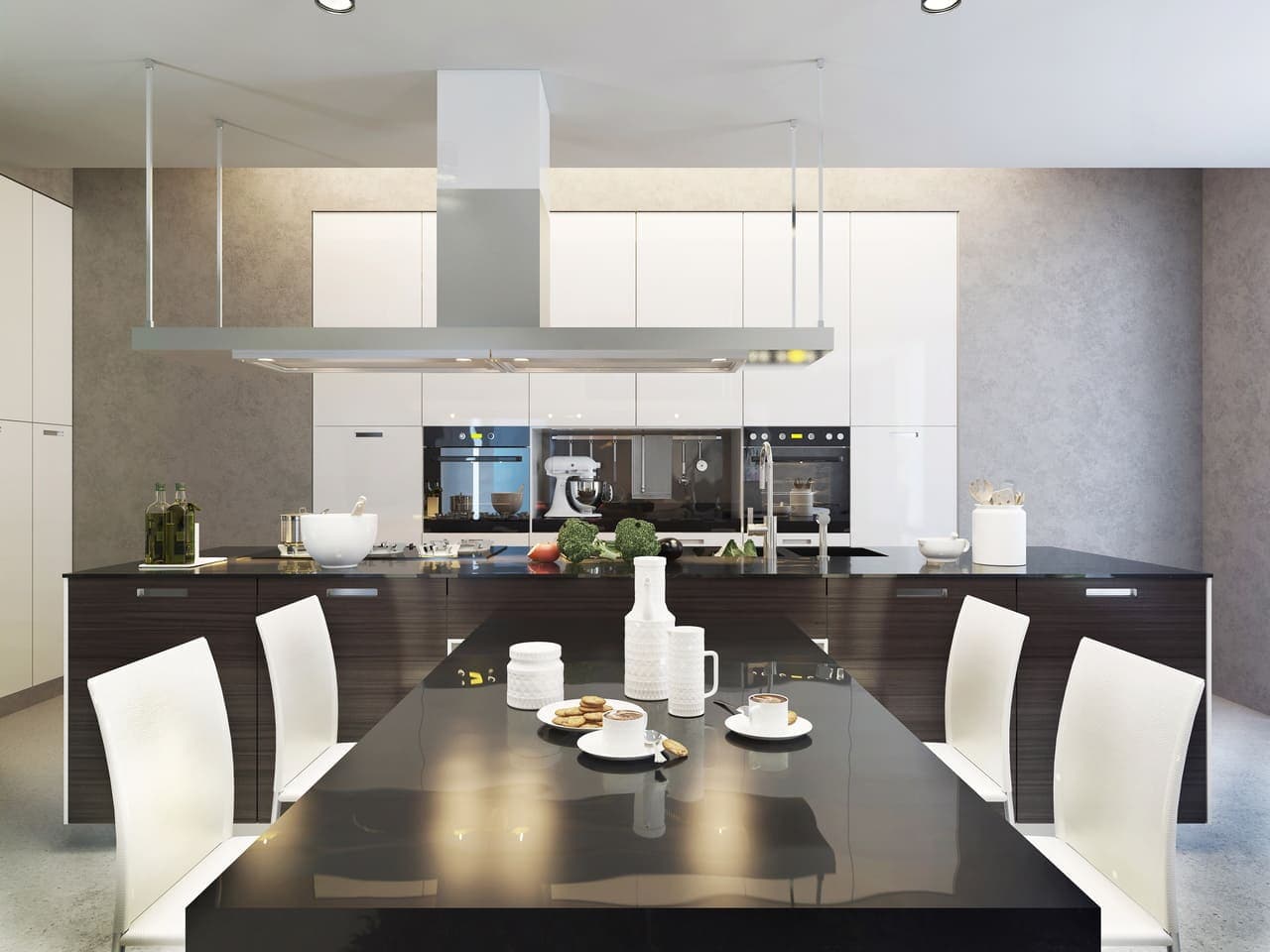 Matte charcoal surfaces, minimal hardware, and a clean run of full-height cabinetry.